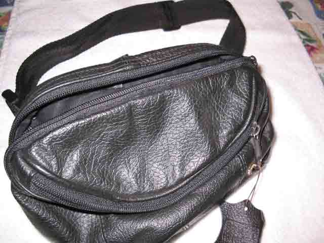 Black leather fanny pack for holding cash